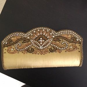 Beautifully beaded gold clutch
